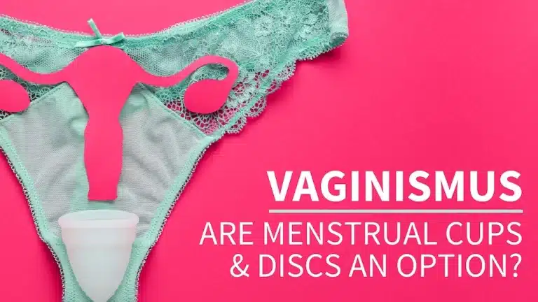 Vibrant pink background with a pair of light turquoise underwear laid flat. On top is a paper cut out of a uterus and a menstrual cup. Overlaid text reads: Vaginismus | Are Menstrual Cups & Discs An Option?